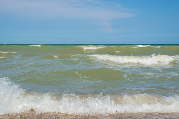 Waves on the sea. View from the shore.