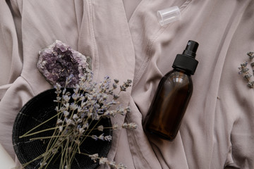 Glass brown bottle with organic cosmetics