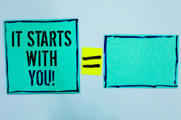 Word writing text It Starts With You. Business concept for Motivation for starting doing something Have discipline Black lined green sticky notes blank and with words mid equal mark