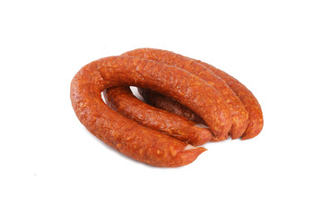  Thin sausage on a white background. Food product.