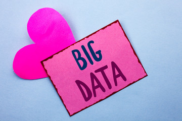 Writing note showing Big Data. Business photo showcasing Huge Data Information Technology Cyberspace Bigdata Database Storage written Pink Sticky Note Paper the Plain background with Heart.