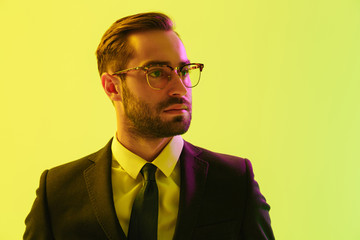 Handsome young businessman wearing formal suit
