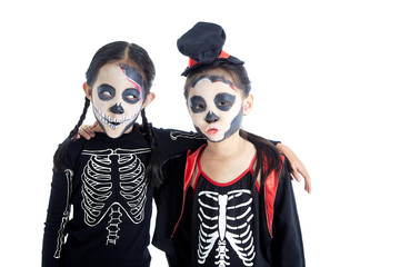Asian Kids with face-paint and Halloween costumes