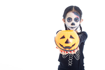 little girl holding jack o lantern pumpkin basket