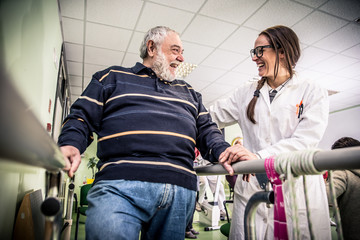 Group of seniors making activities inside the hospice.