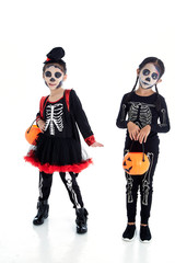 Asian Kids with face-paint and Halloween costumes