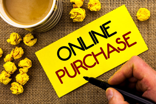 Text sign showing Online Purchase. Conceptual photo Buy things on the net Go shopping without leaving home written Sticky Note Paper the jute background Cup and Paper Balls next to it.