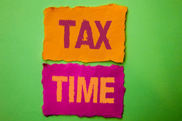 Handwriting text Tax Time. Concept meaning Taxation Deadline Finance Pay Accounting Payment Income Revenue written Tear Papers the Green background.