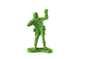 miniature toy soldier on white background, close-up