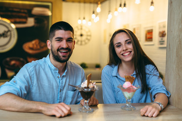 happy couple eating ice cream