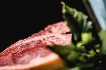 big piece of steak on with a hackpeil