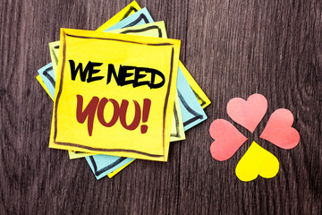 Text sign showing We Need You Motivational Call. Conceptual photo Company wants to recruit Employee required written Stacked Sticky Note Papers the wooden background Hearts next to it.