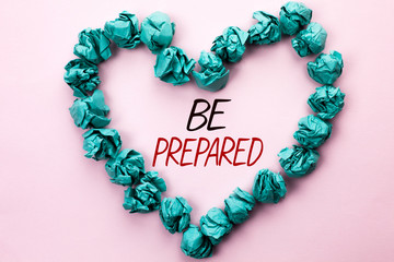 Conceptual hand writing showing Be Prepared. Business photo text Preparedness Challenge Opportunity Prepare Plan Management written Plain background within Heart Paper Balls.