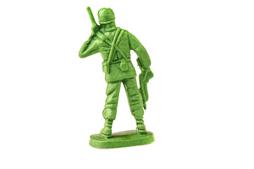 miniature toy soldier on white background, close-up