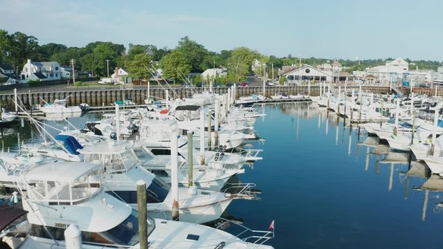 Sunrise Aerial Drone Flyover of Quiet Marina (Norwalk, Connecticut)