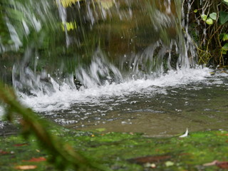 water flowing over river