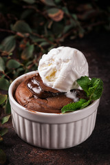 Chocolate fondant with a scoop of ice cream. Hot dessert. French dessert.