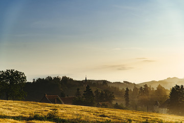 Obraz premium sunset over a field