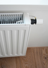 House white radiator heating with thermostat