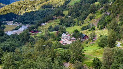 Fototapeta na wymiar View on little village from the most beautiful train journey Flamsbana between Flam and Myrdal in Aurland in Western Norway