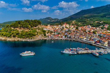 Fototapeta na wymiar Aerial cityscape view of the coastal city of Parga, Greece during the Summer
