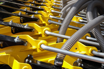 Fototapeta premium Szczegóły i mechanizmy maszyn i urządzeń rolniczych