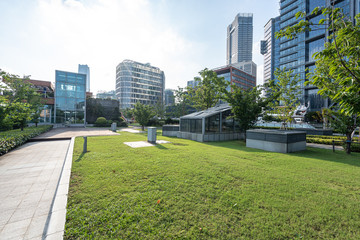 green lawn with city skyline in shanghai china