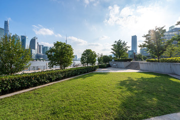 Fototapeta na wymiar green lawn with city skyline in shanghai china