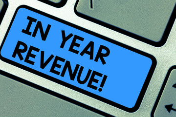 Writing note showing In Year Revenue. Business photo showcasing Annual business income economical financial analysis Keyboard key Intention to create computer message pressing keypad idea