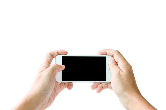 Man hand holding white smartphone with black blank screen. Isolated on white background photo.