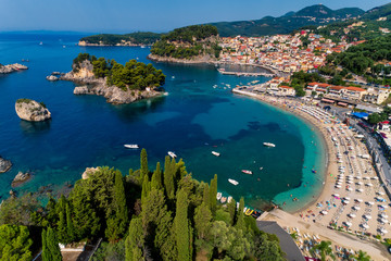 Fototapeta premium Aerial cityscape view of the coastal city of Parga, Greece during the Summer