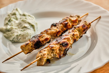 Souvlaki and tzatziki on plate