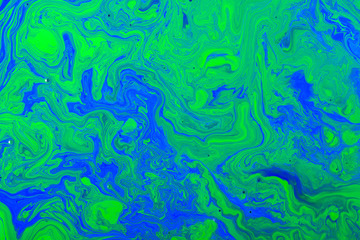 Fototapeta na wymiar Mixture of acrylic paints Abstract liquid marble texture Fluid art. Deep colour background