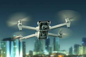 Drone quadcopter flying above city