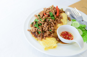 Fried basil with pork on an omelette and Fish sauce with chilli,