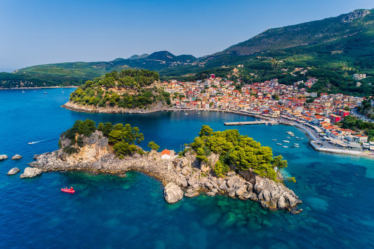 Aerial cityscape view of the coastal city of Parga, Greece during the Summer