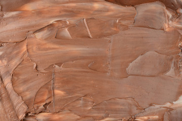 Chocolate cream background. Space for text or design.