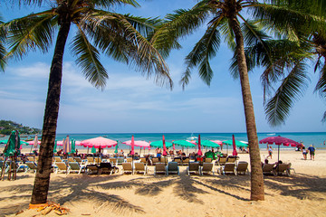 Travelers rest on the canvas bed, Kran Beach on March 28,2018 in Phuket,Thailand