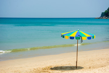 Rainbow umbrella spread on Karon beach, in Phuket,Thailand.