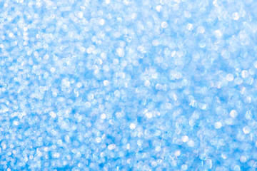 Fototapeta na wymiar Abstract beautiful background of blue sparkles for festive design
