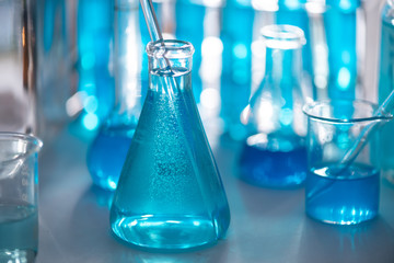  Chemical research with blue liquid