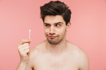 Beauty portrait of a handsome shirtless brunette man
