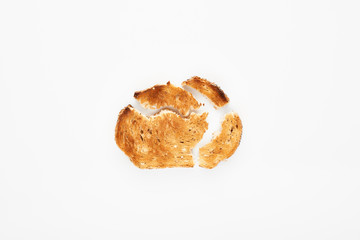 Smashed slice of toast bread isolated on white.