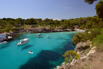 Fototapeta na wymiar sailing yacht in a beautiful blue lagoon