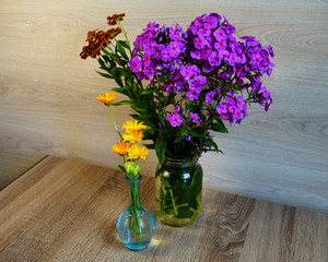  Still-life with purple Phlox flowers, orange flowers.  