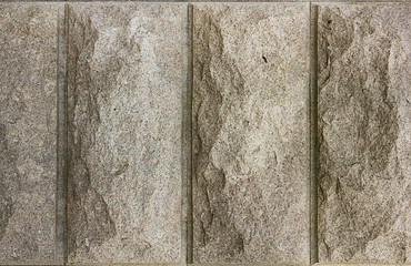 stone wall texture background. wall of gray granite blocks.