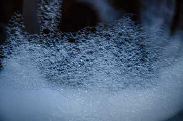 Abstract background of foam bubbles close up