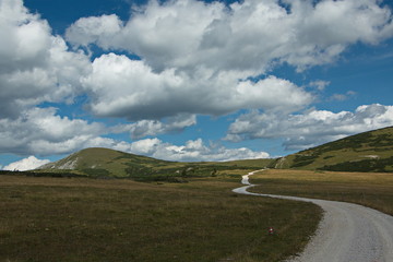 Nice clouds above the trail to Lurgbauerhütte on Schneealpe in Lower Austria, Europe