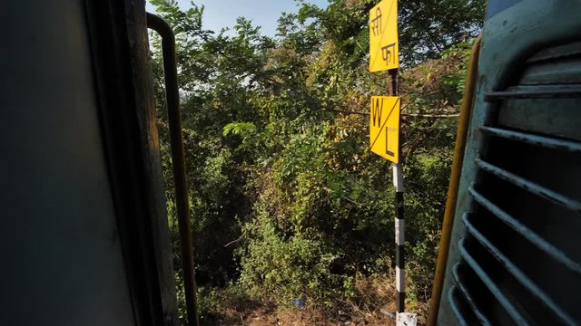 View of the nature and lakes of south India from the train platform.