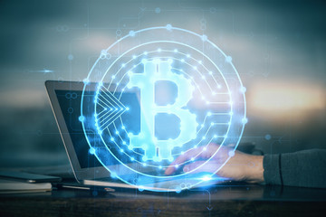 Blockchain theme hud with businessman working on computer on background. Concept of crypto chain. Double exposure.